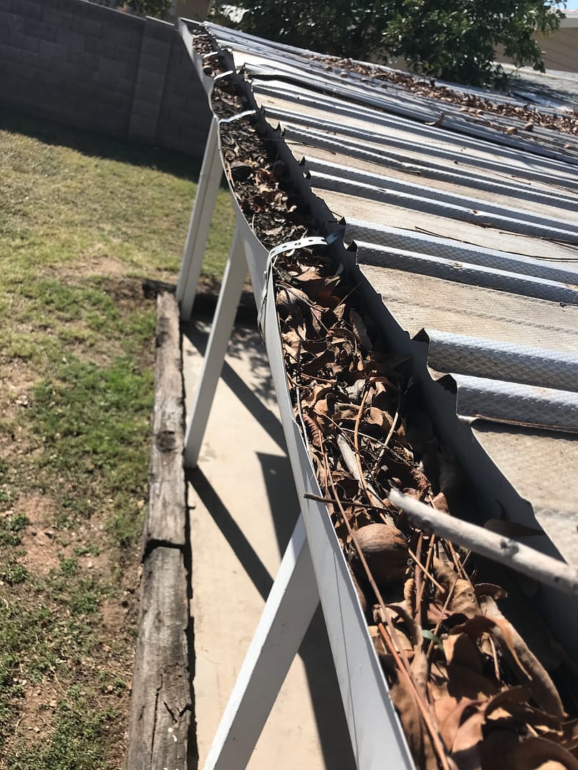 Before Gutter Cleaning Dirty Gutters